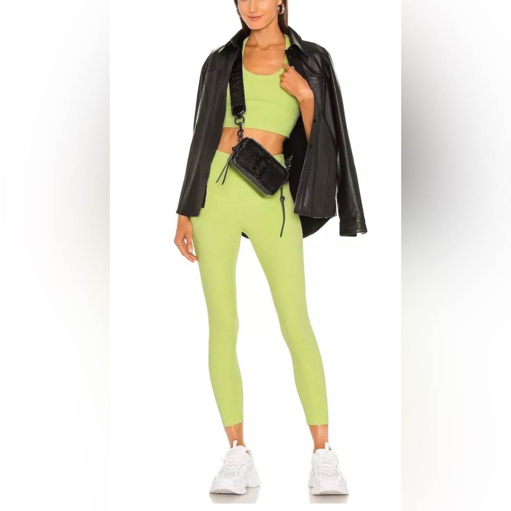Koral High Rise Black Out Leggings in Citrina Green size Small